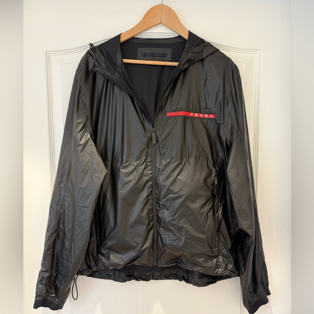 Prada Black Windbreaker Jacket for Men, folds into small bag.